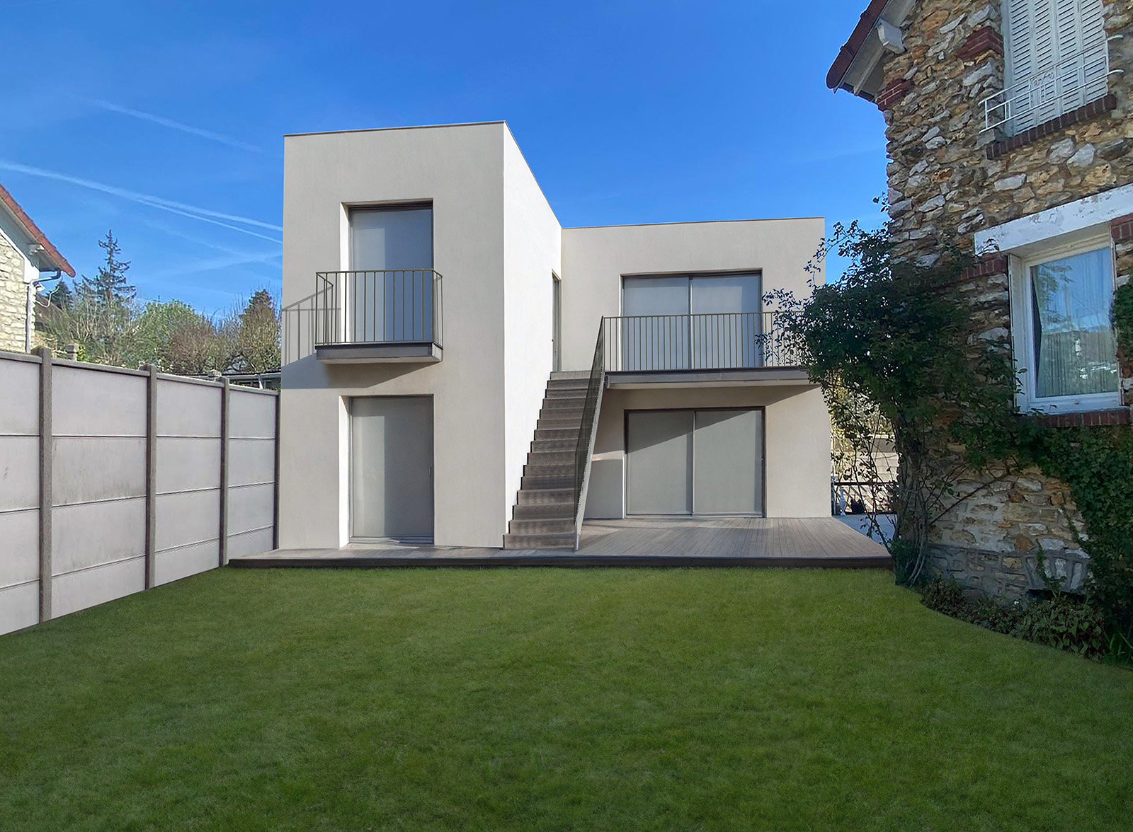 Projet de réhabilitation d'une dépendance transformée en habitation, illustrant l'optimisation des volumes, la qualité des finitions et l'approche architecturale développée par l'agence d'architecture NFAU.
